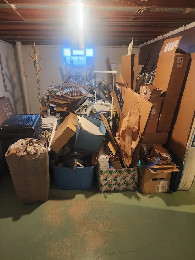 Roll-off dumpster container at job site for Yard Waste Dumpster Rental in Elkins